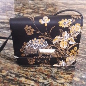Small purse with multi colored flowers